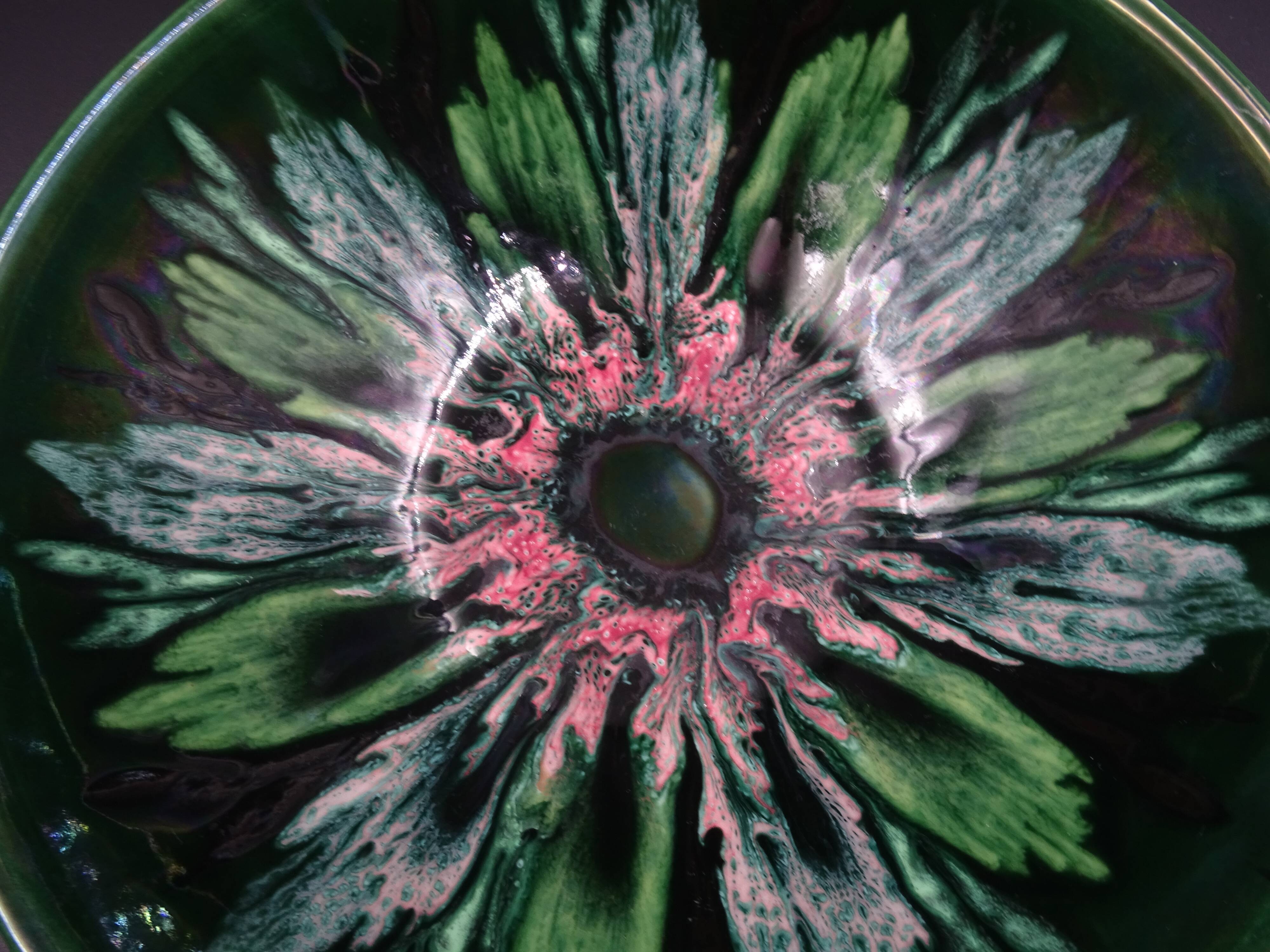 Green faience bowl decorated with multicolored drips around 1970