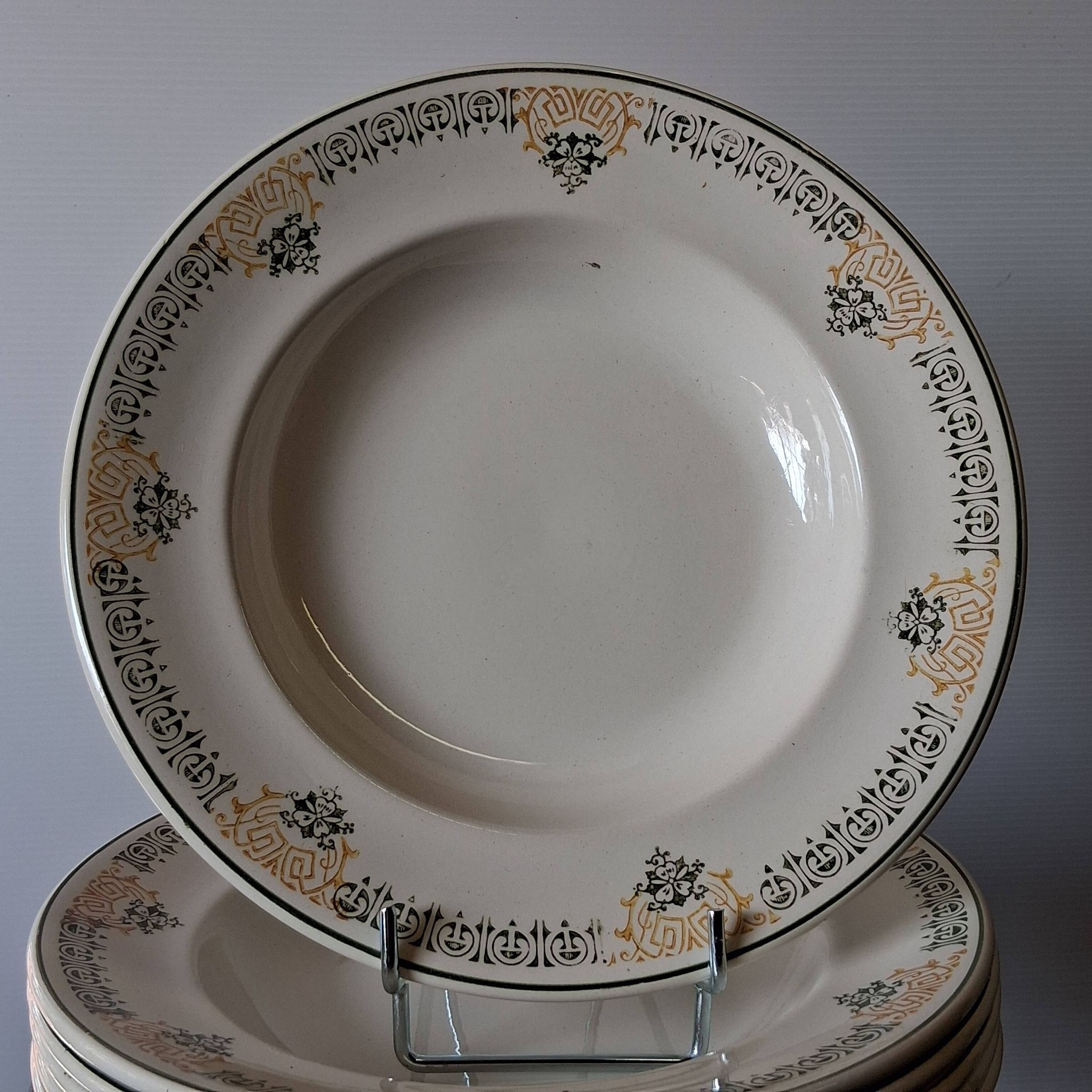Set of 7 antique deep plates from Longwy, "Savigny" model, in good condition.