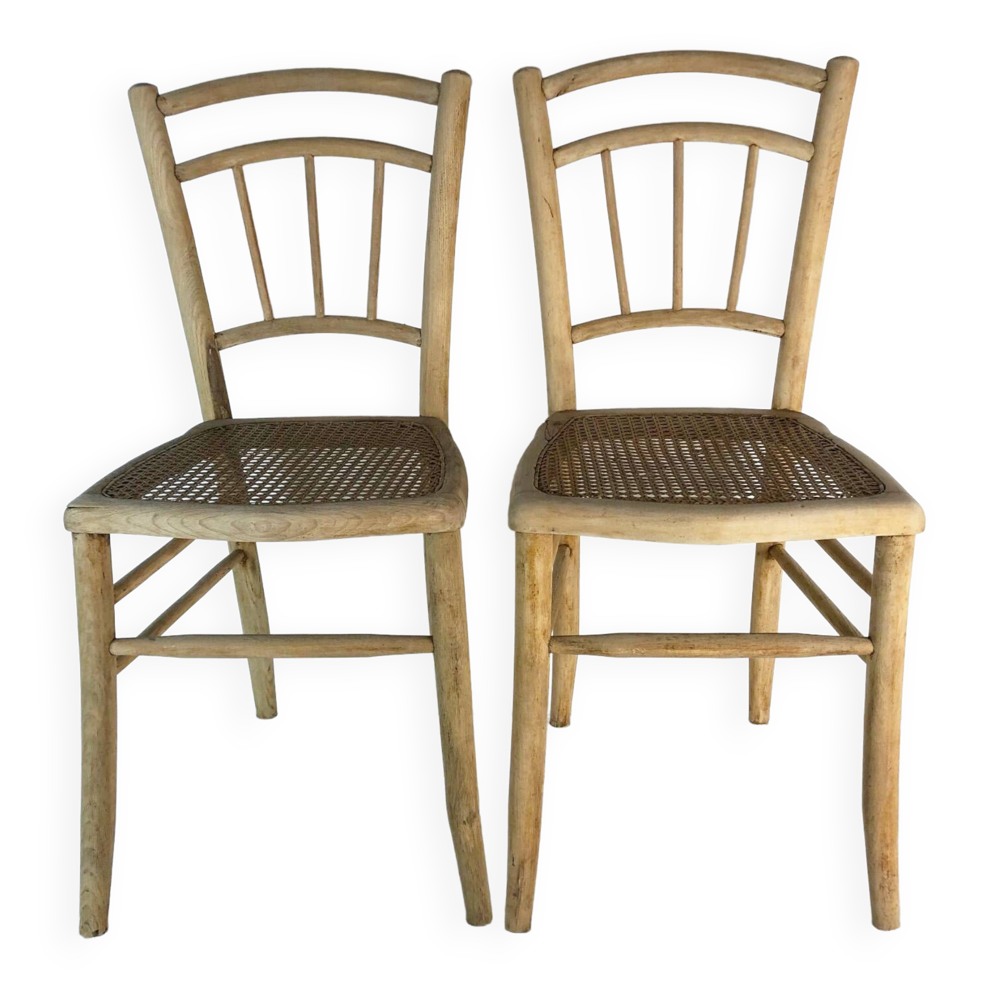 Paire de chaises cannées en bois clair