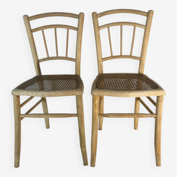 Paire de chaises cannées en bois clair