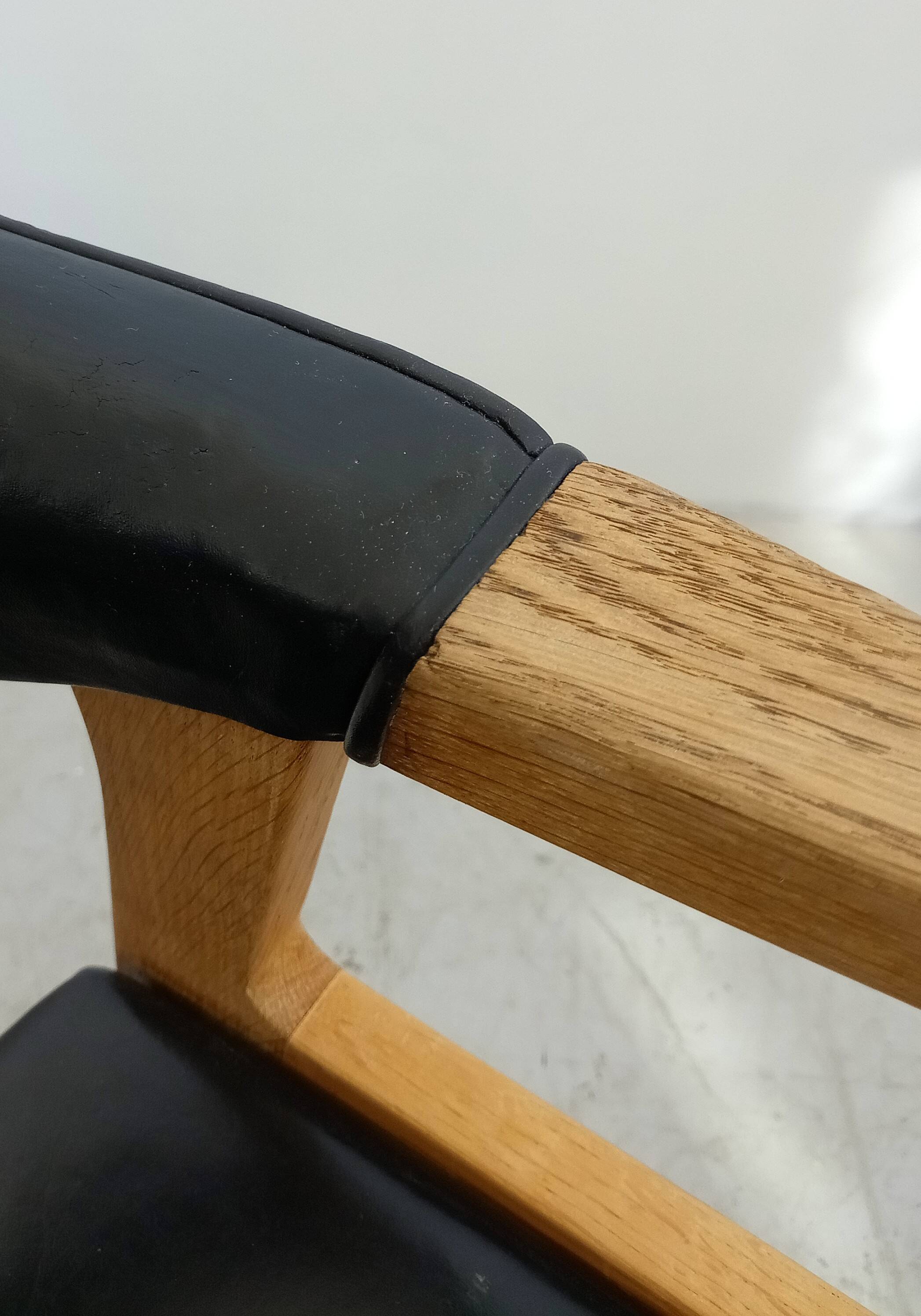 Danish armchair in oak and black leather