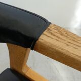 Danish armchair in oak and black leather