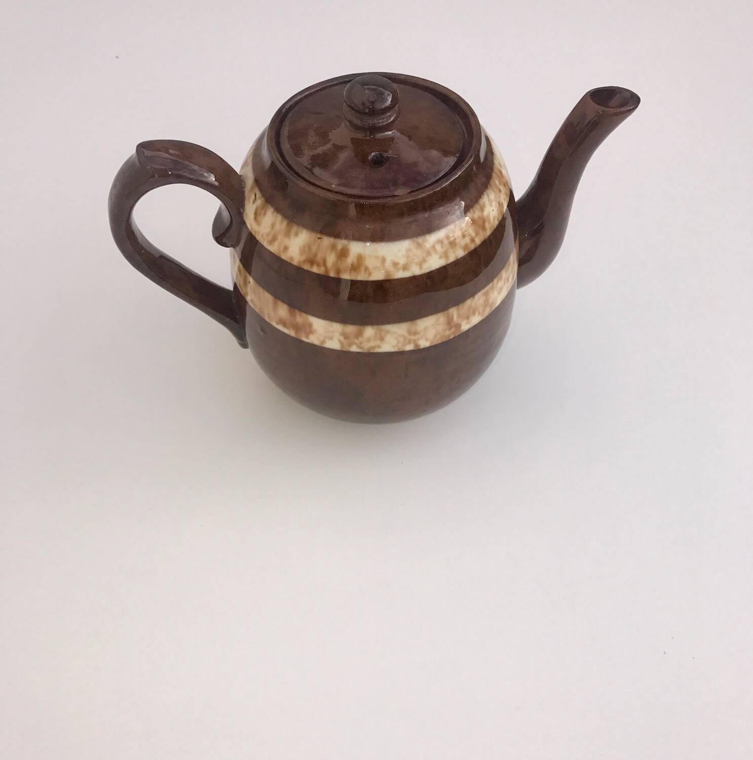 A brown England teapot