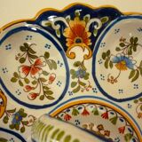 Dish, egg server in hand-painted earthenware, signed Geo Martel