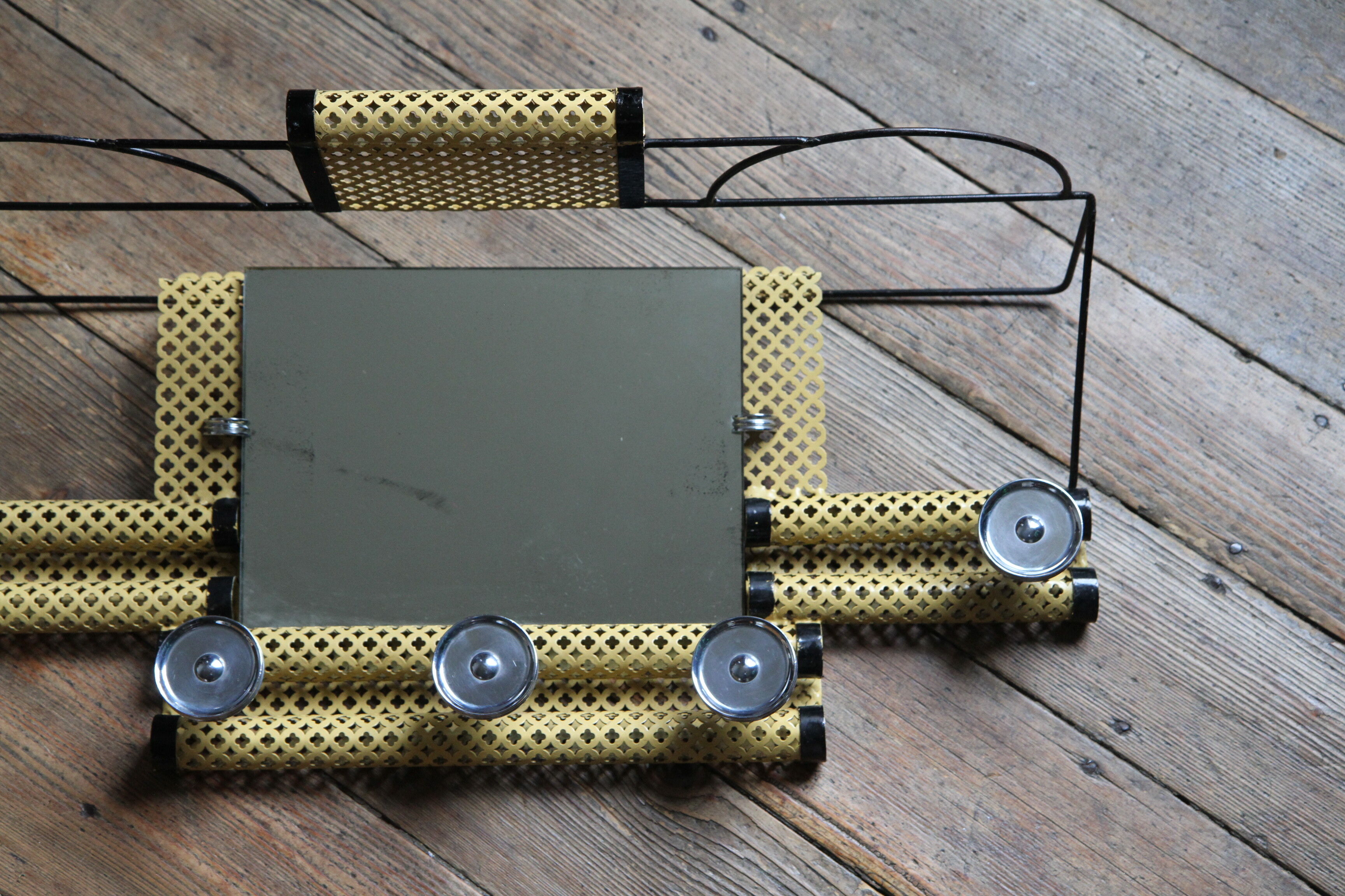 1950s perforated metal coat holder