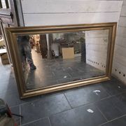 Golden mirror in oak from the 19th century.