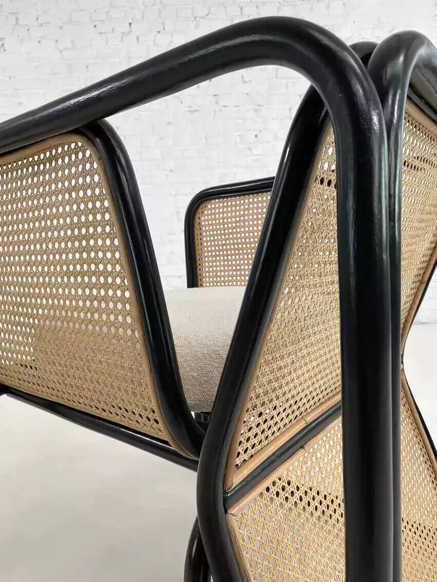 Cubic armchair in black rattan and canework