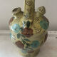 Mediterranean ceramic jug with floral decoration.