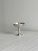 Silver-plated metal bowl on a stand