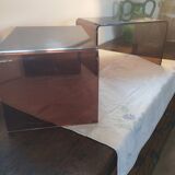 Matching pair of sofa foot stools in smoked perspex 1970