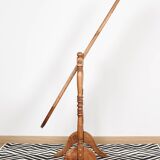 Large psychic mirror on legs with pivoting oval frame.