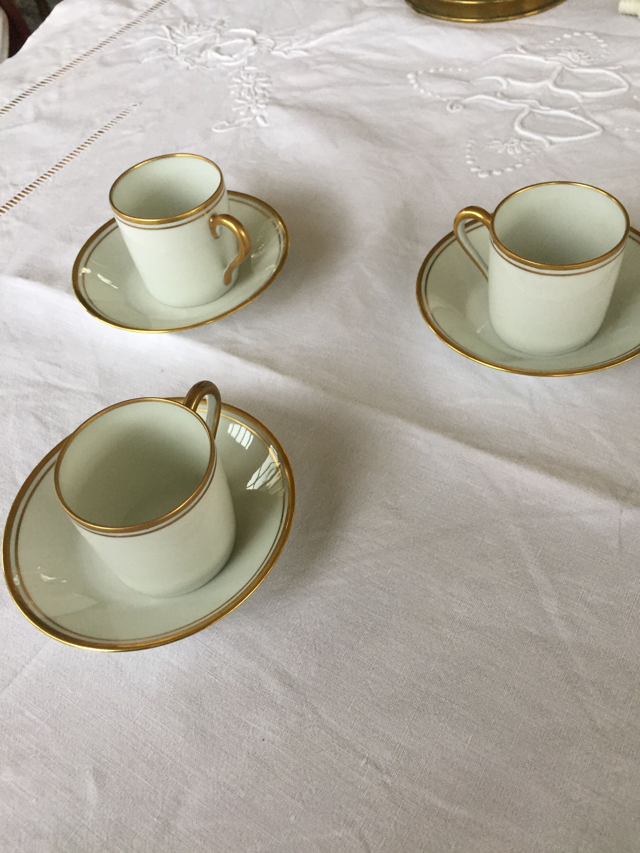 3 cups and their limoges porcelain undercup