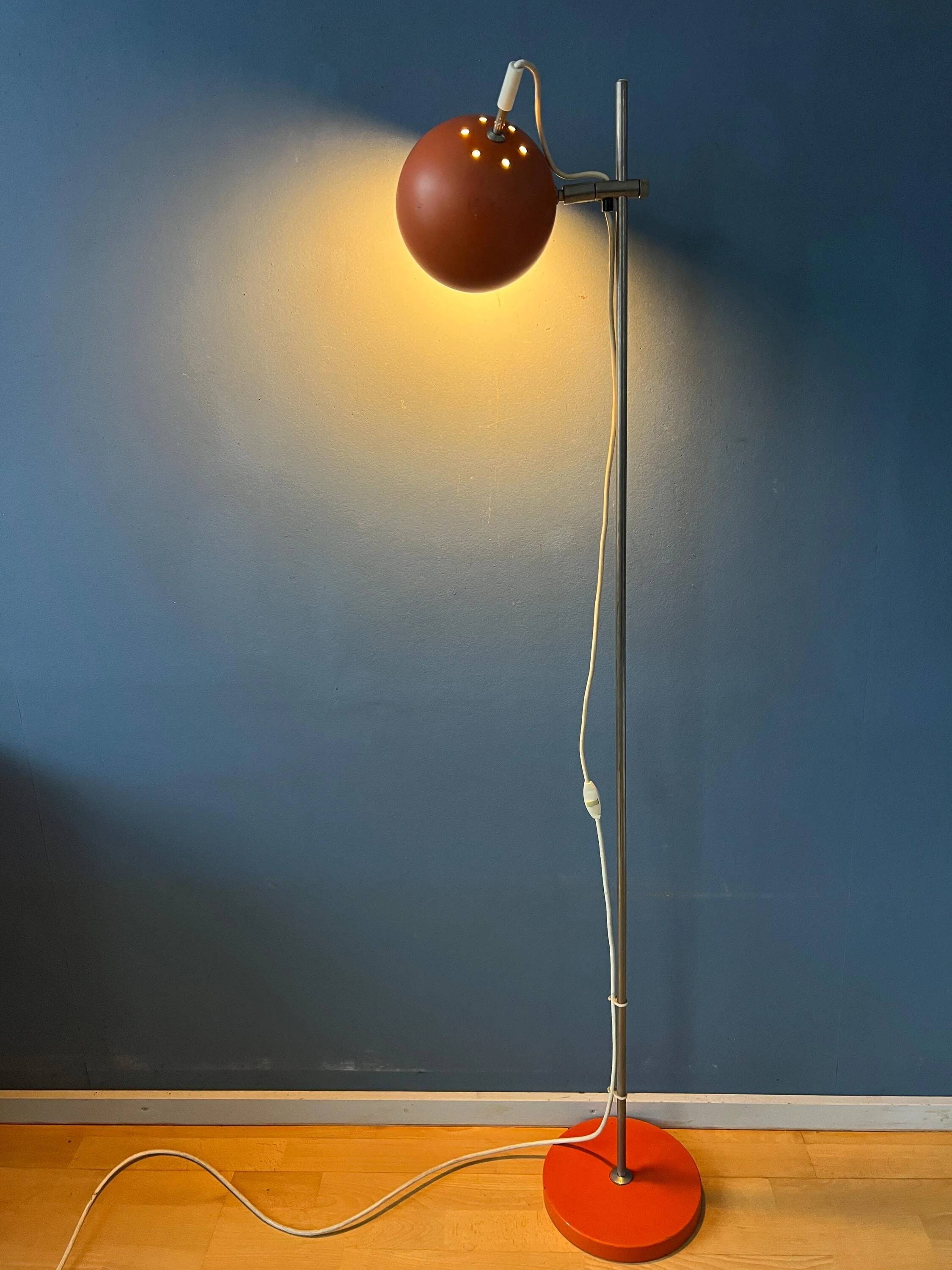 Mid-Century orange floor lamp with "eyeball" shade