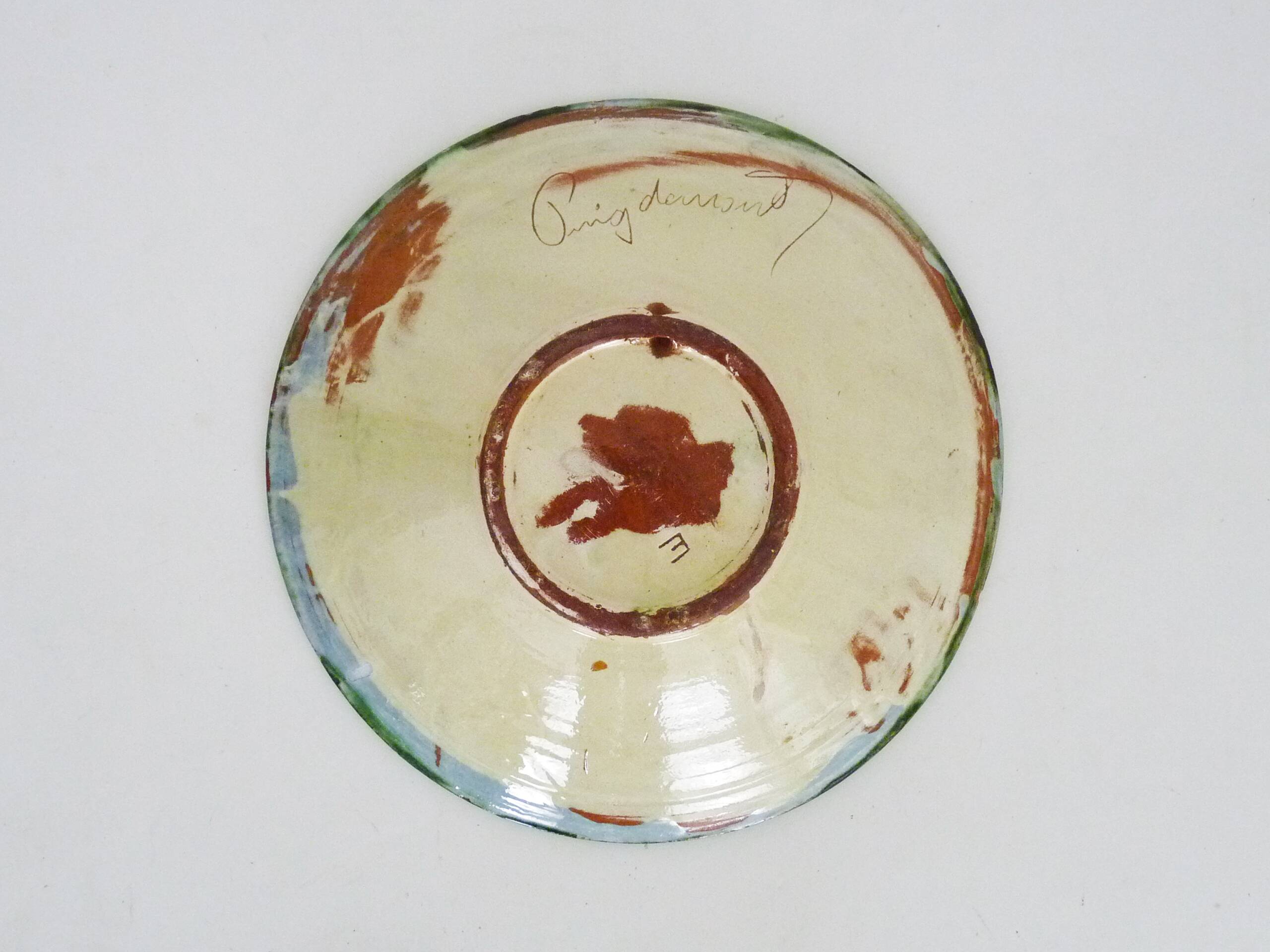 Decorative ceramic wall plate with fish decoration by Puigdemont.