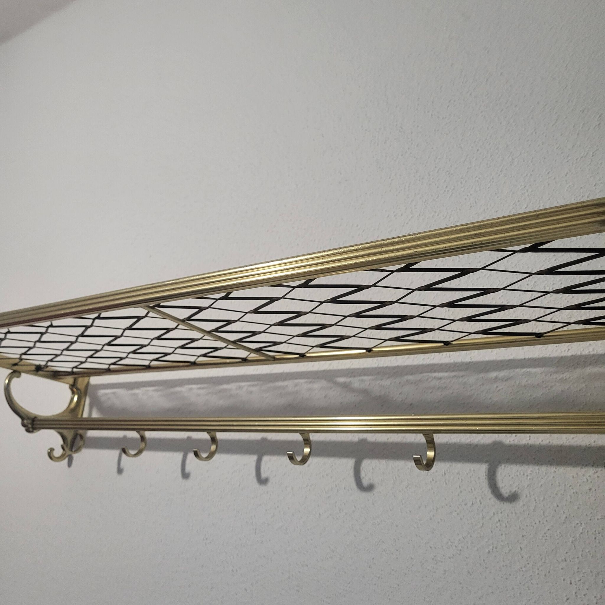 Coat rack in gold aluminum from the 50s and 60s