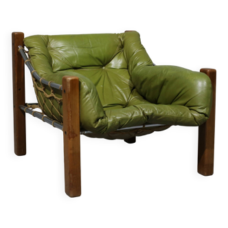Fauteuil en cuir par Jean Gillon