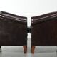 Set of two cowhide club armchairs in good condition with a English design