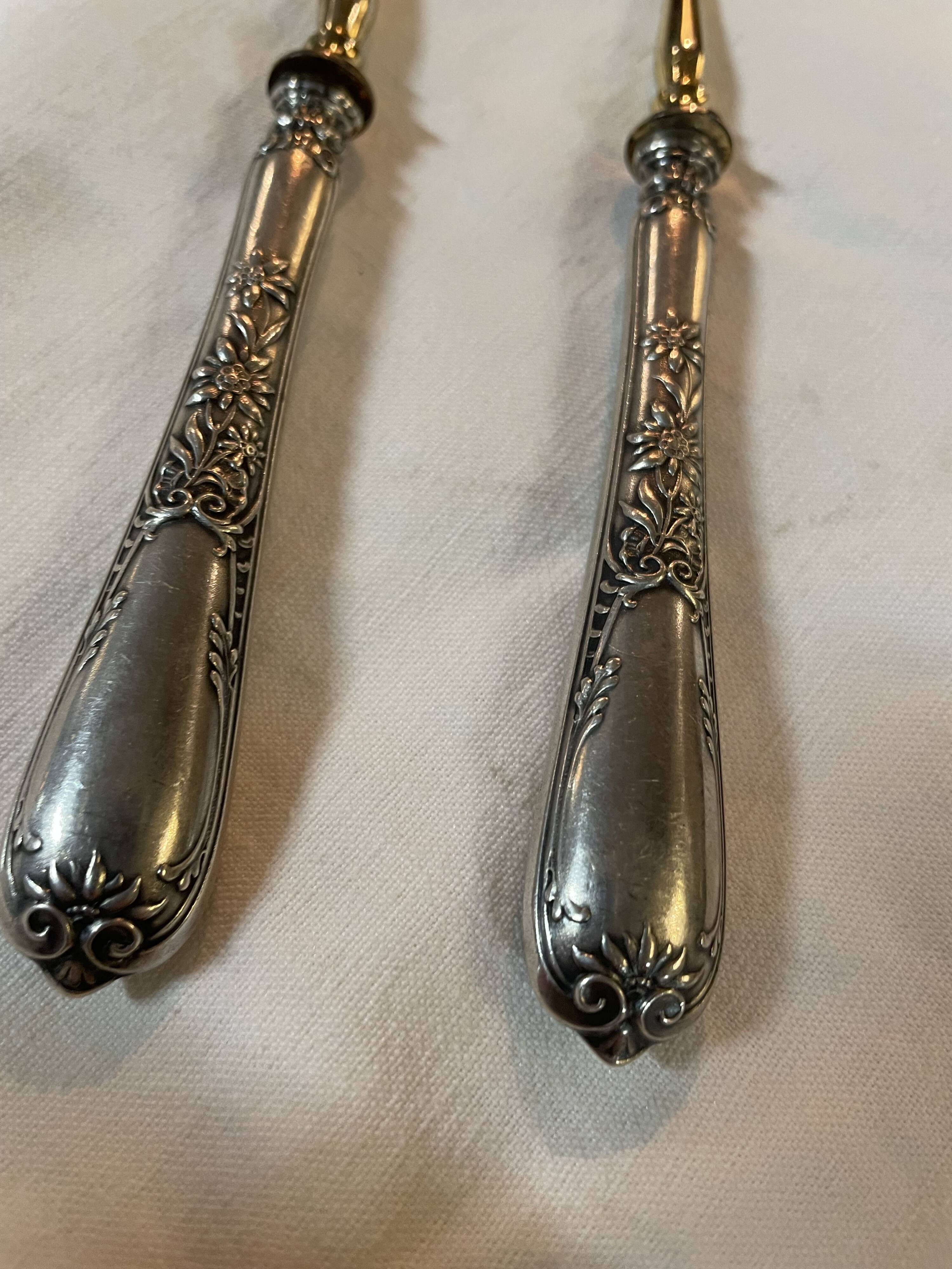 Paire de fourchettes à charcuterie en argent