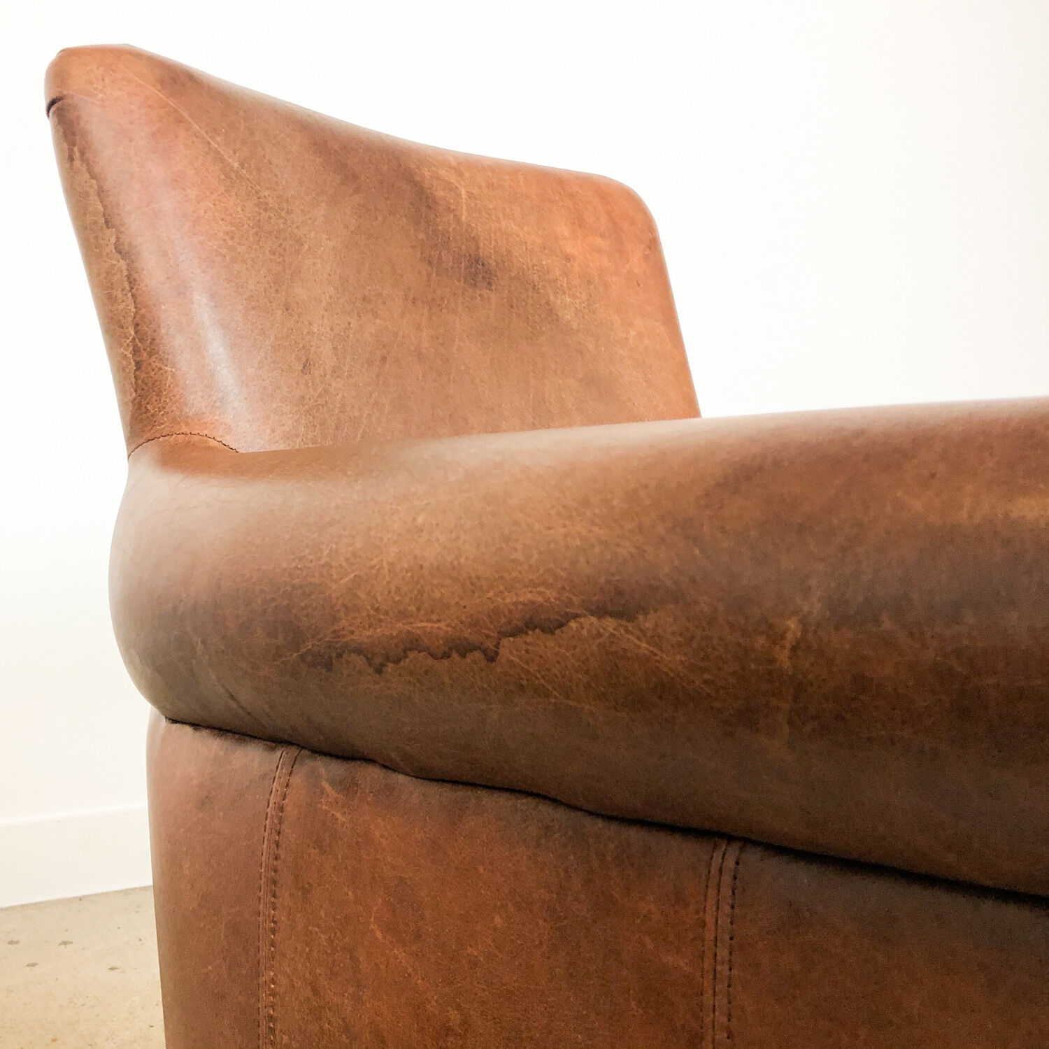 Set of two vintage leather armchairs