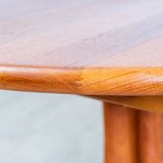 1970s solid teak dining table with Scandinavian design.