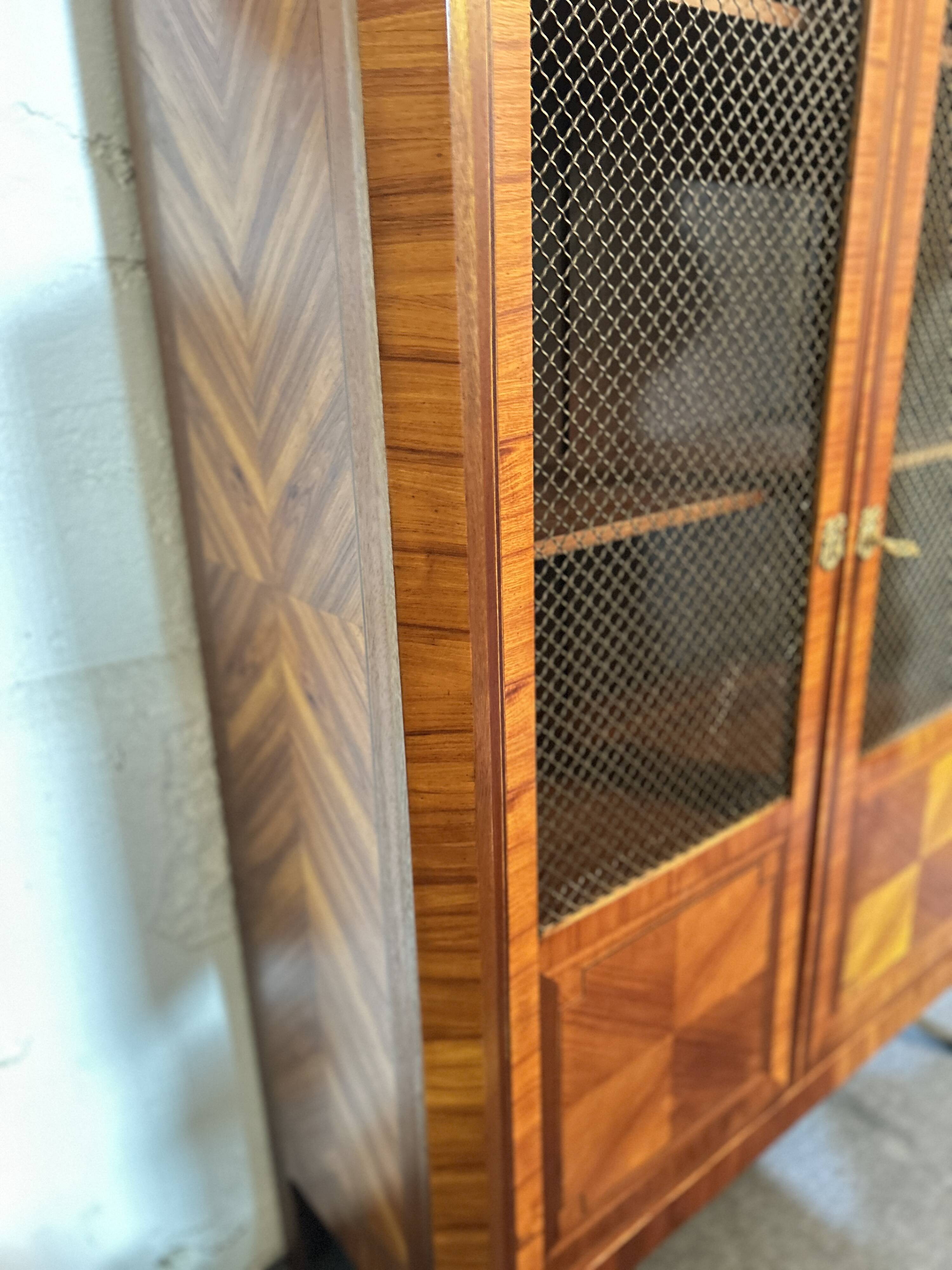 Directoire style display cabinet with two doors