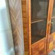 Directoire style display cabinet with two doors