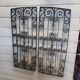 Ancienne paire de grilles en fer forgé