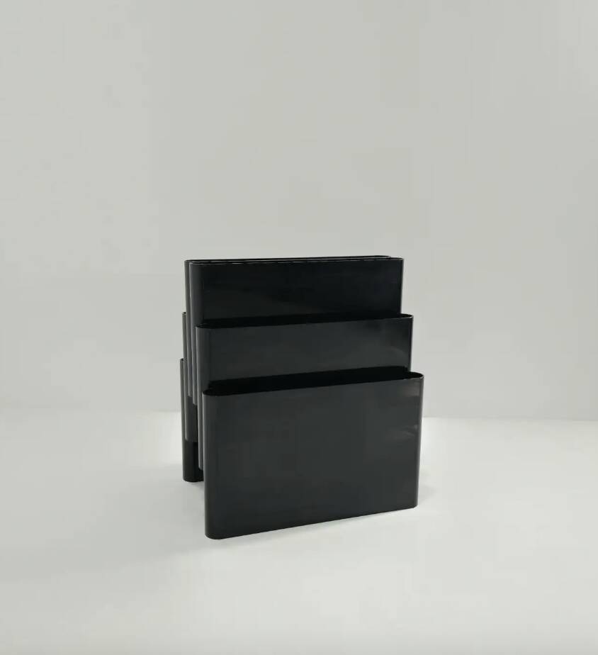 Large black magazine rack by Giotto Stoppino for Kartell, Italy 1970.