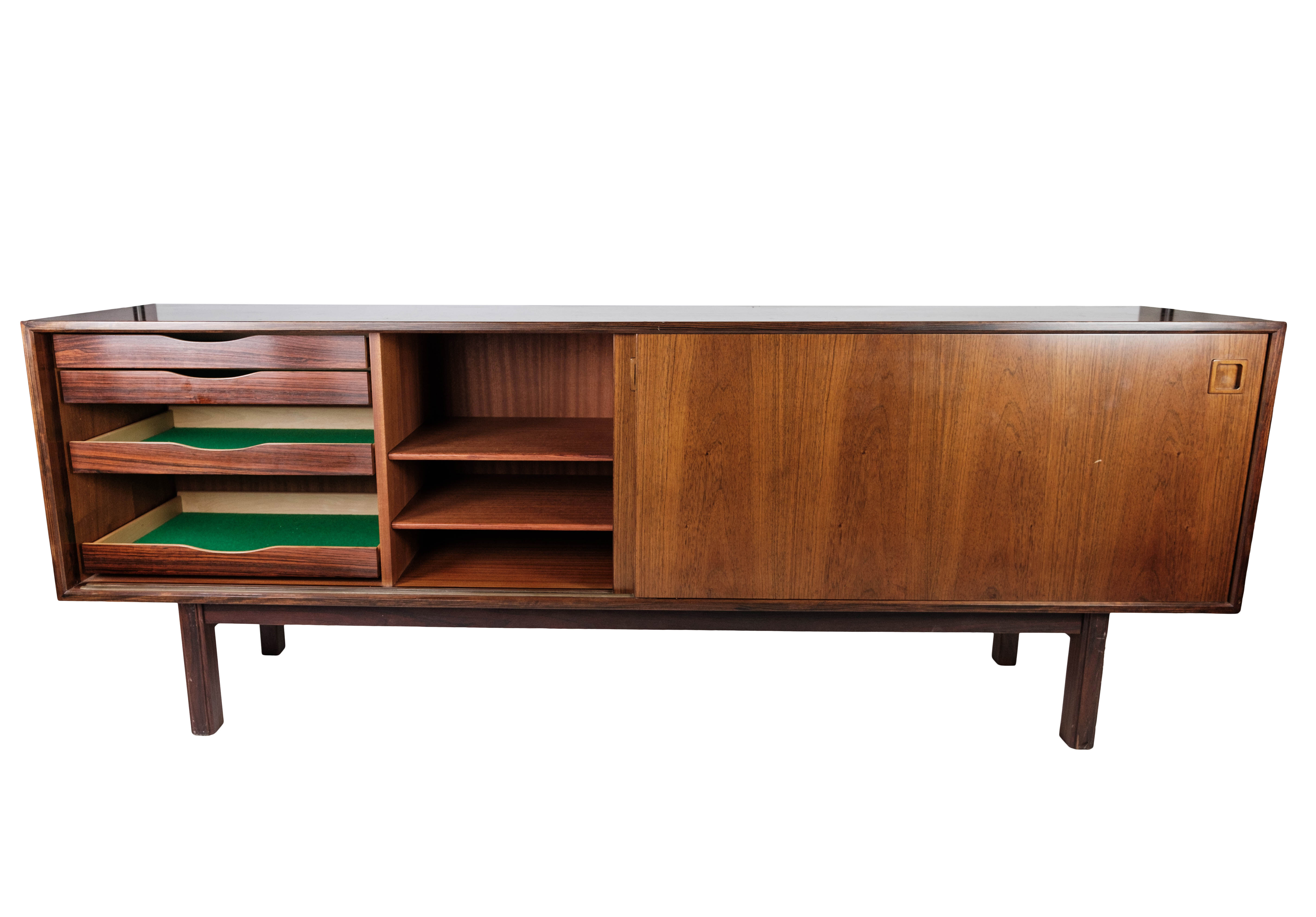 Sideboard in rosewood with sliding doors designed by Omann Junior from the 1960s.