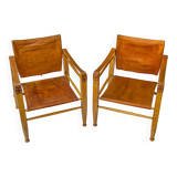 A pair of Danish beechwood and leather Safari armchairs - 1960