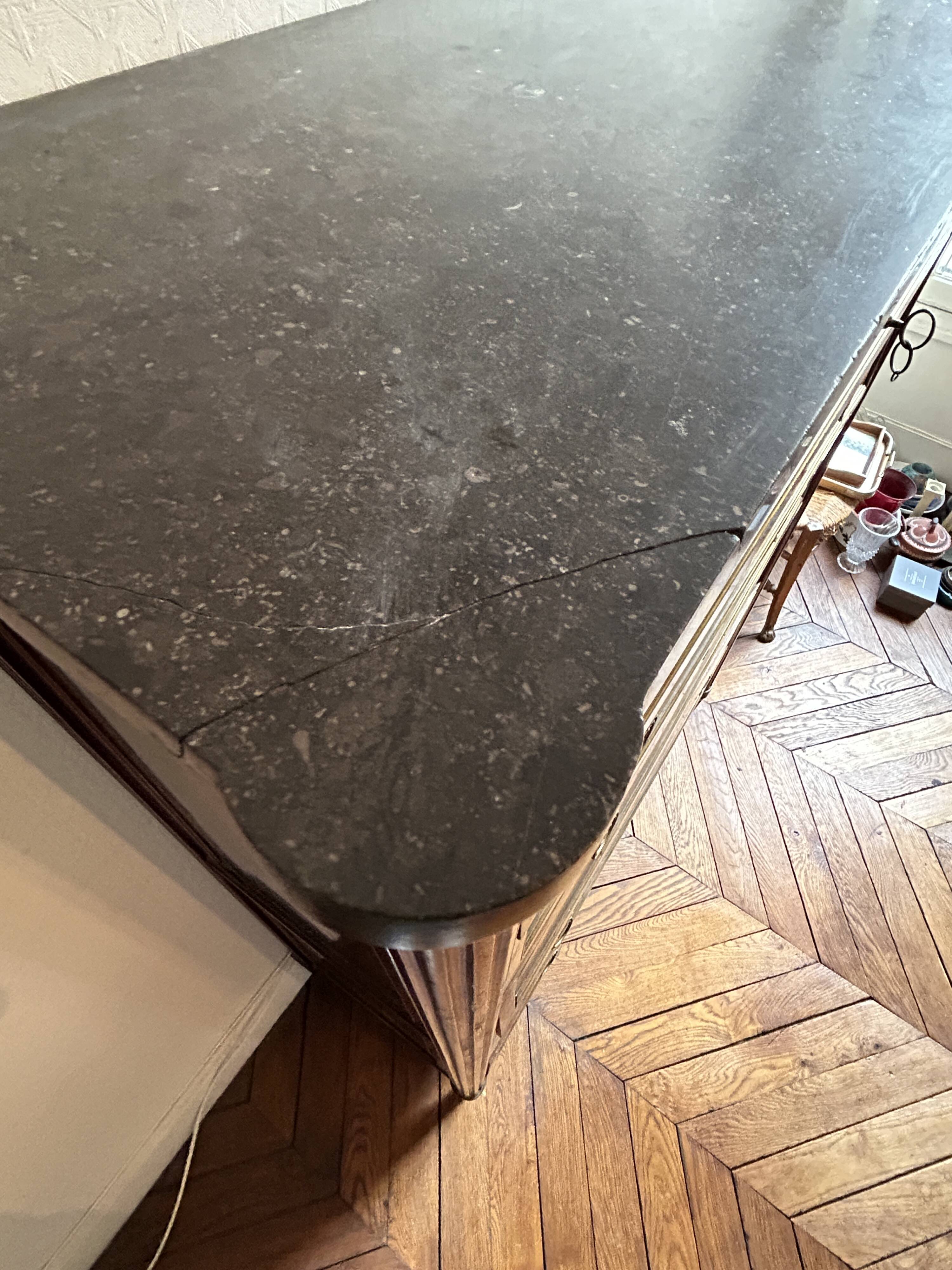 Mahogany and black marble chest of drawers, late 18th-early 19th century