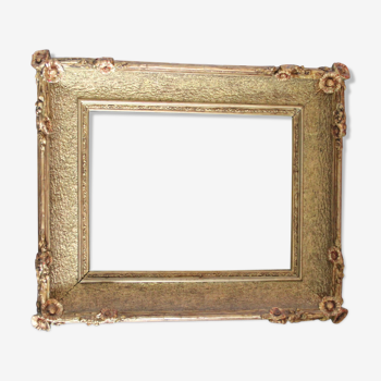 Small wooden frame and gilded stucco