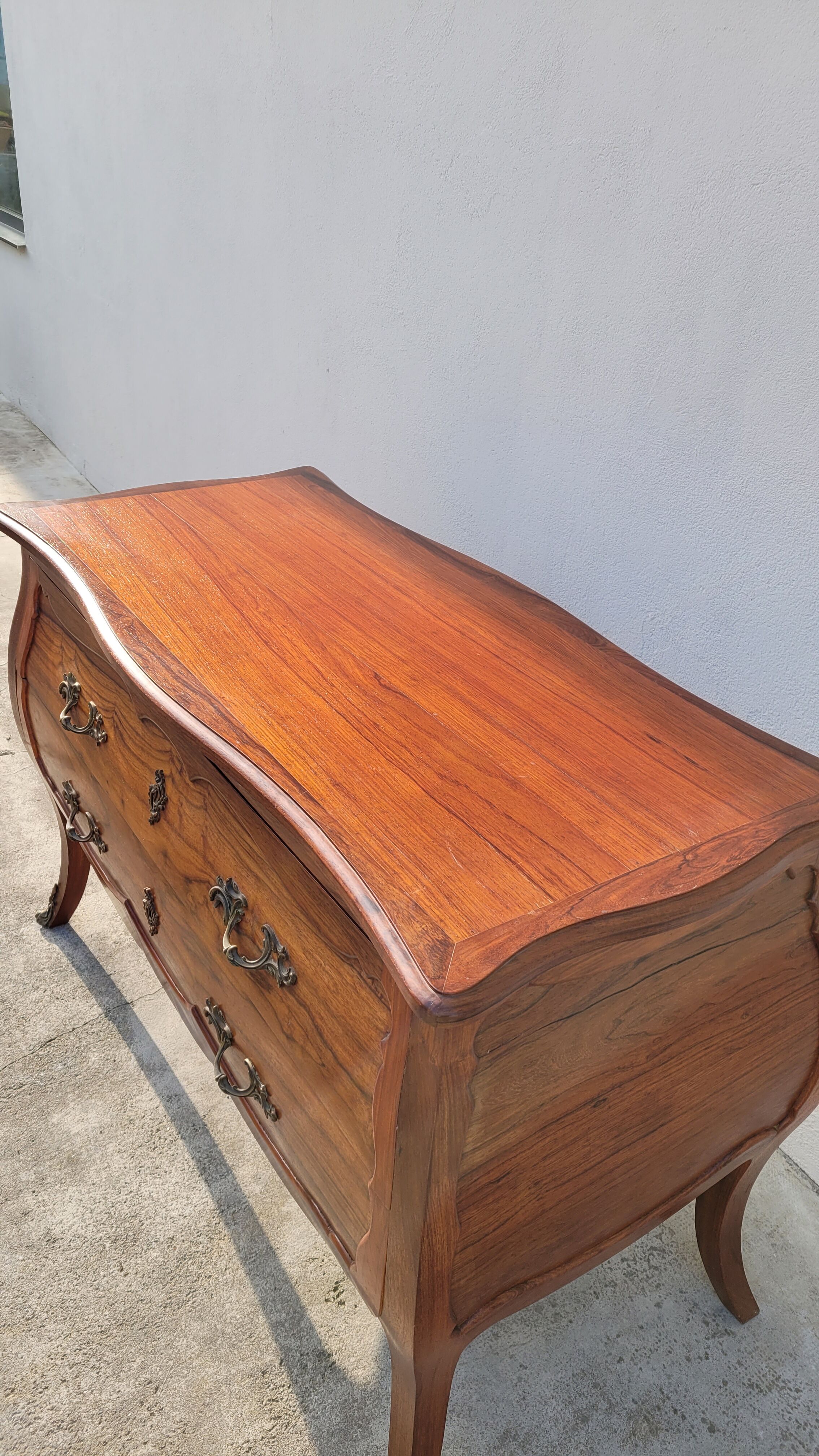 Curved Louis XV style commode in mahogany.