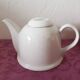 Porcelain teapot with thermal lid