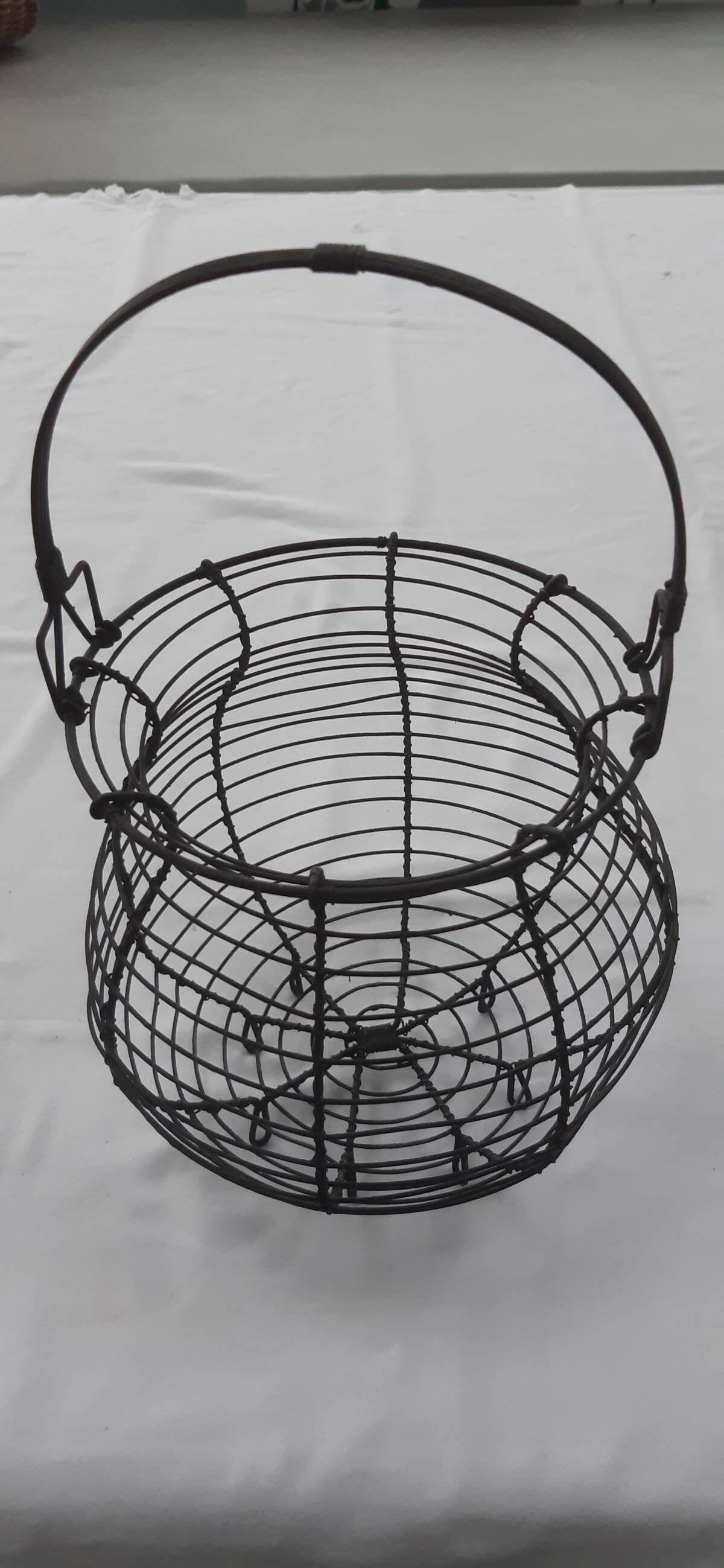 Old metal egg basket