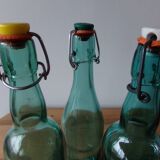 3 old green bottles
