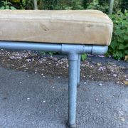 Vintage Italian industrial bench in leather and metal.