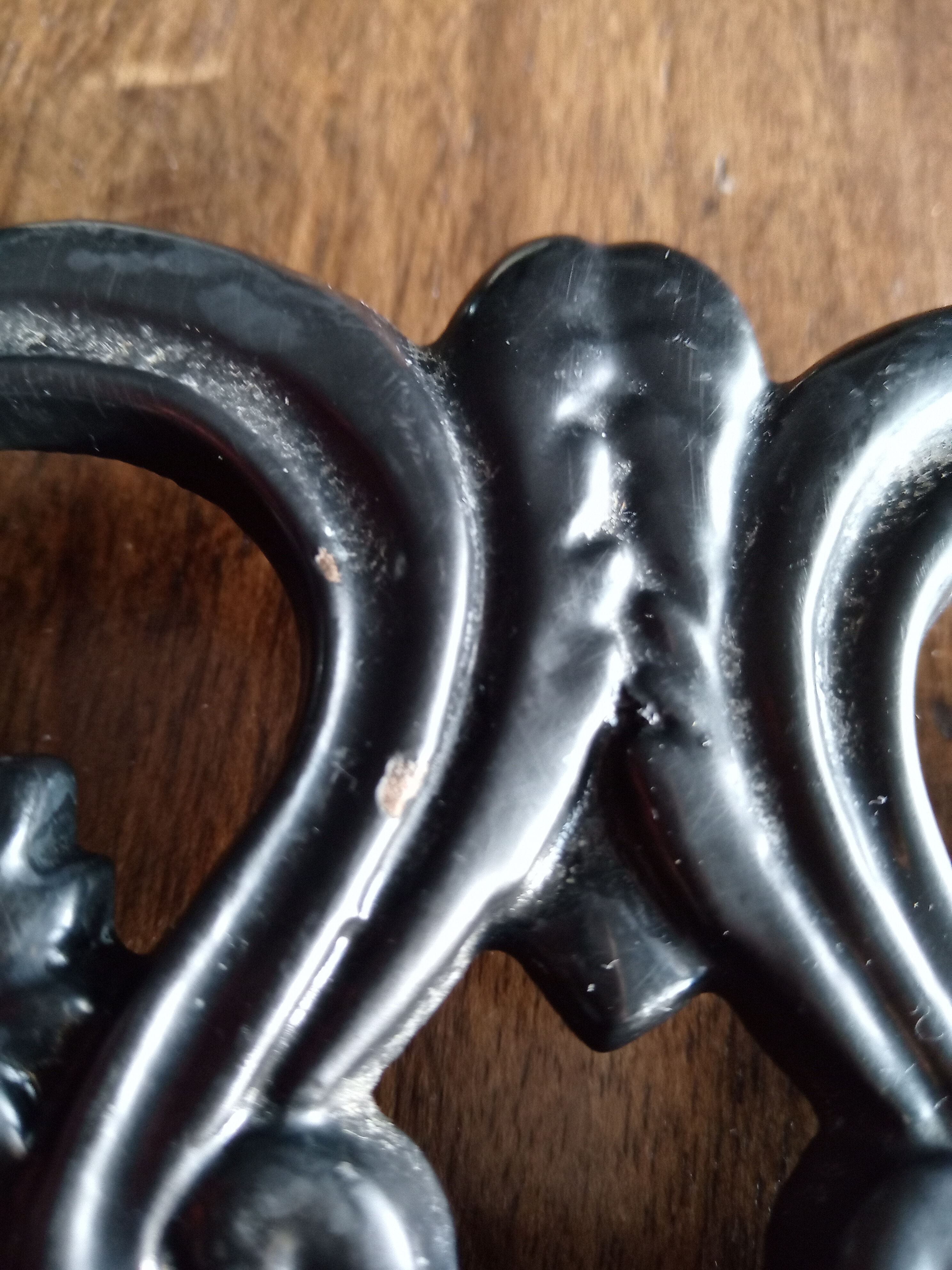 Old dish bottoms in black cast iron