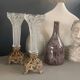 Pair of candlesticks in spelter and moulded glass