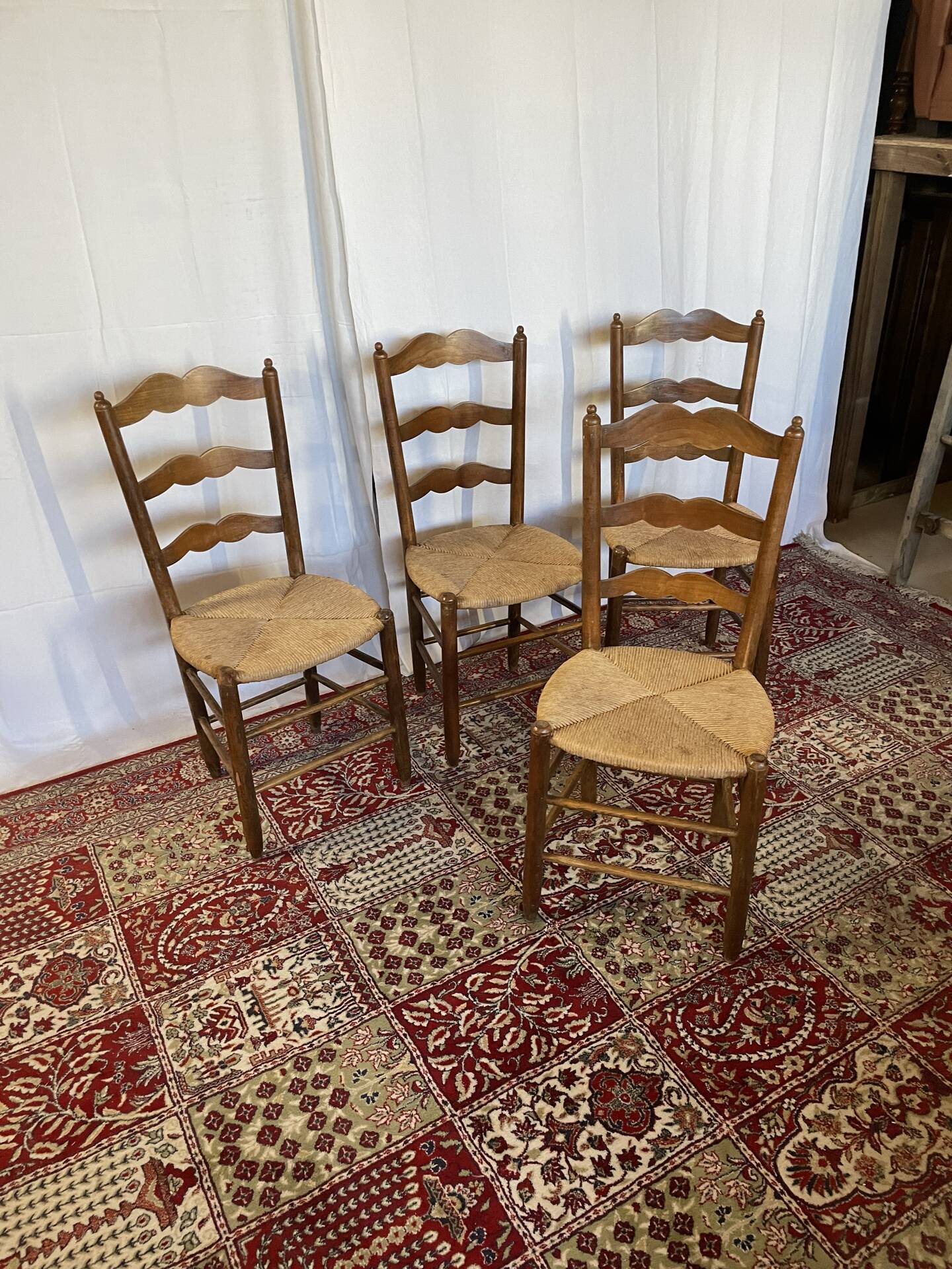 Set of 4 vintage wooden and straw chairs