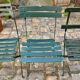 Salon de jardin, table et 4 chaises pliantes en métal vert