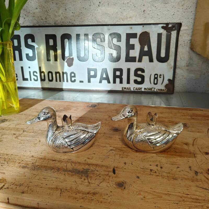 Set of two antique silver-plated candlesticks.