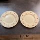 Two identical vintage Clarice Cliff plates from the Newport Pottery.