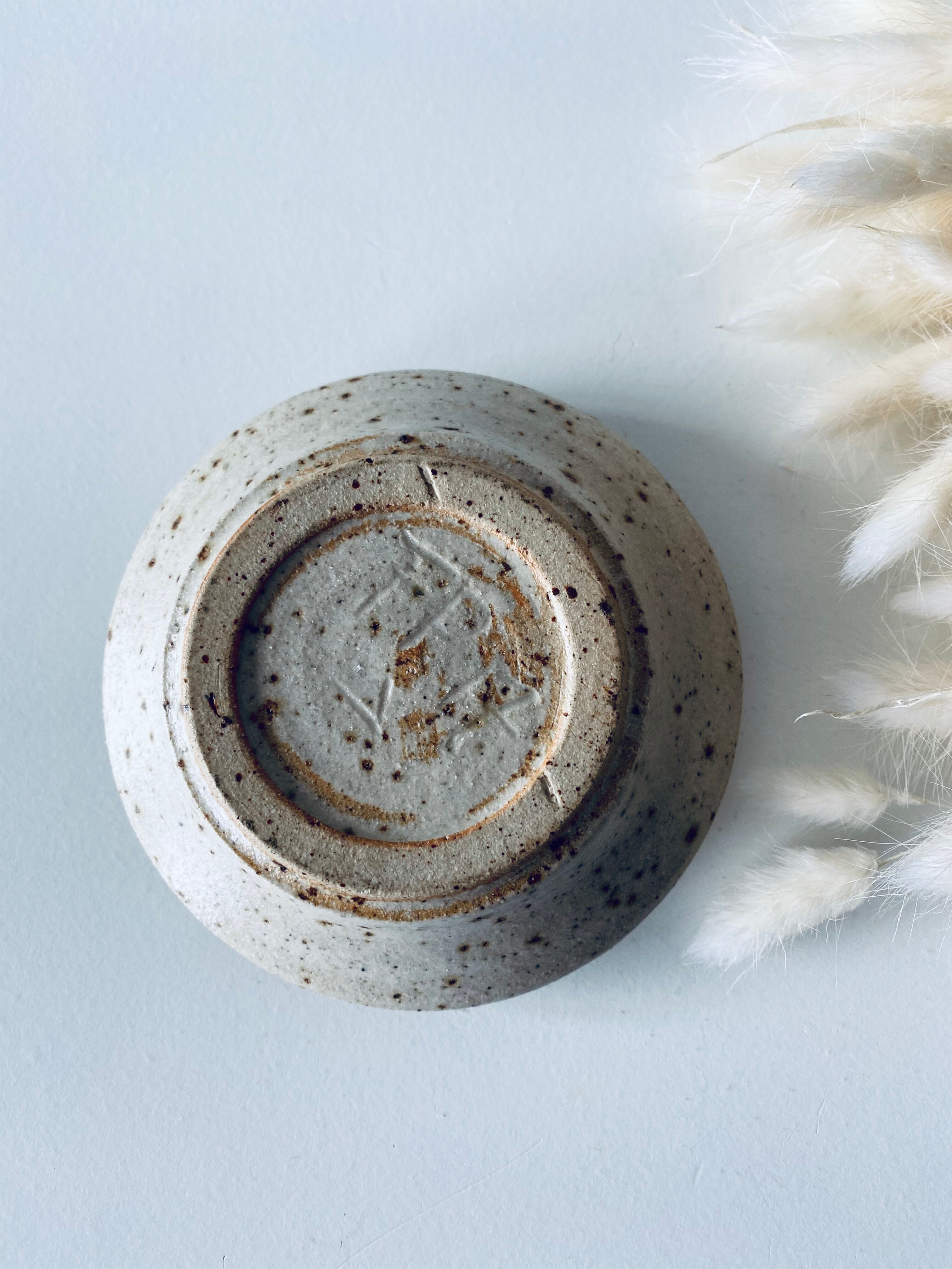 FP-signed sandstone bougeoir