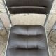 Four vintage chairs from the 1960s and 1970s, chrome with faux leather.
