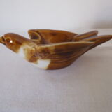 Empty pocket or ashtray model bird