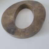 Letter O of sign in vintage gilded brass