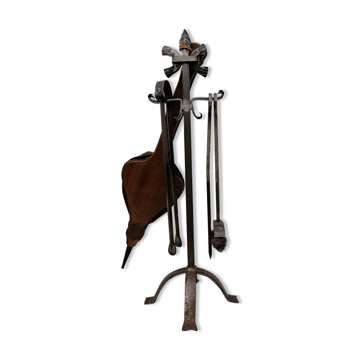 Old wrought iron fireplace servant
