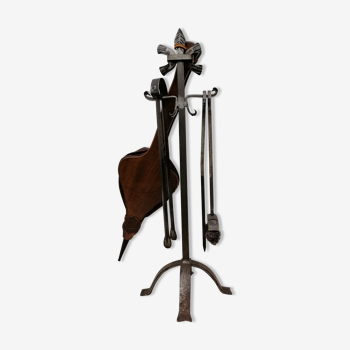 Old wrought iron fireplace servant