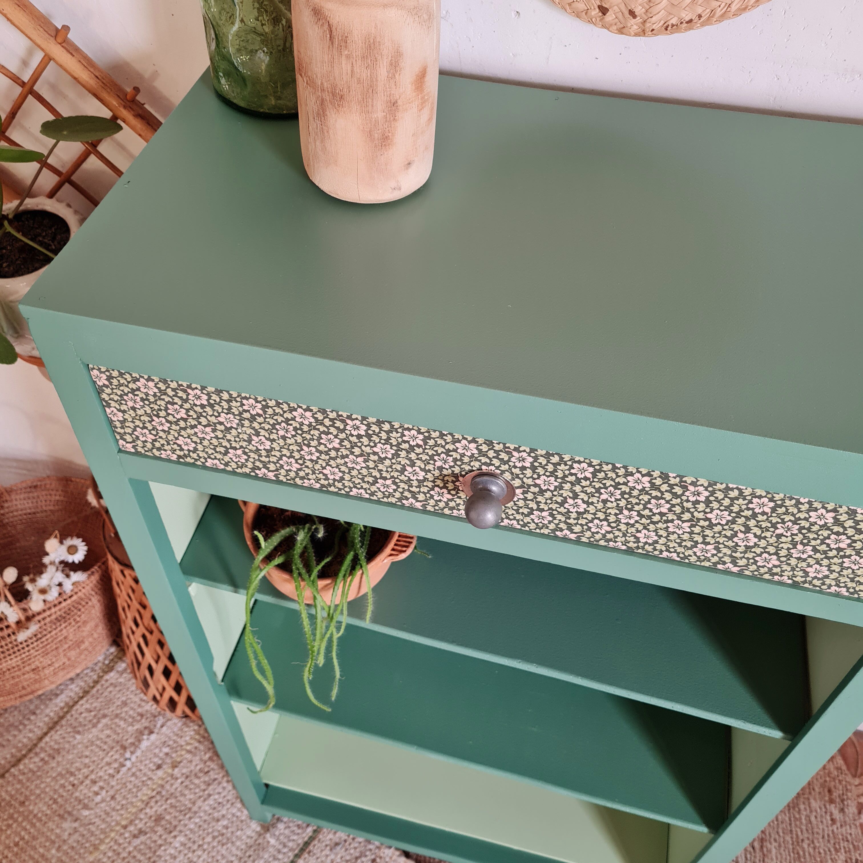 Renovated library shelf green color and floral atmosphere